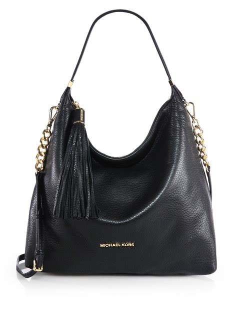 micheal kora purse|michael kors handbag black.